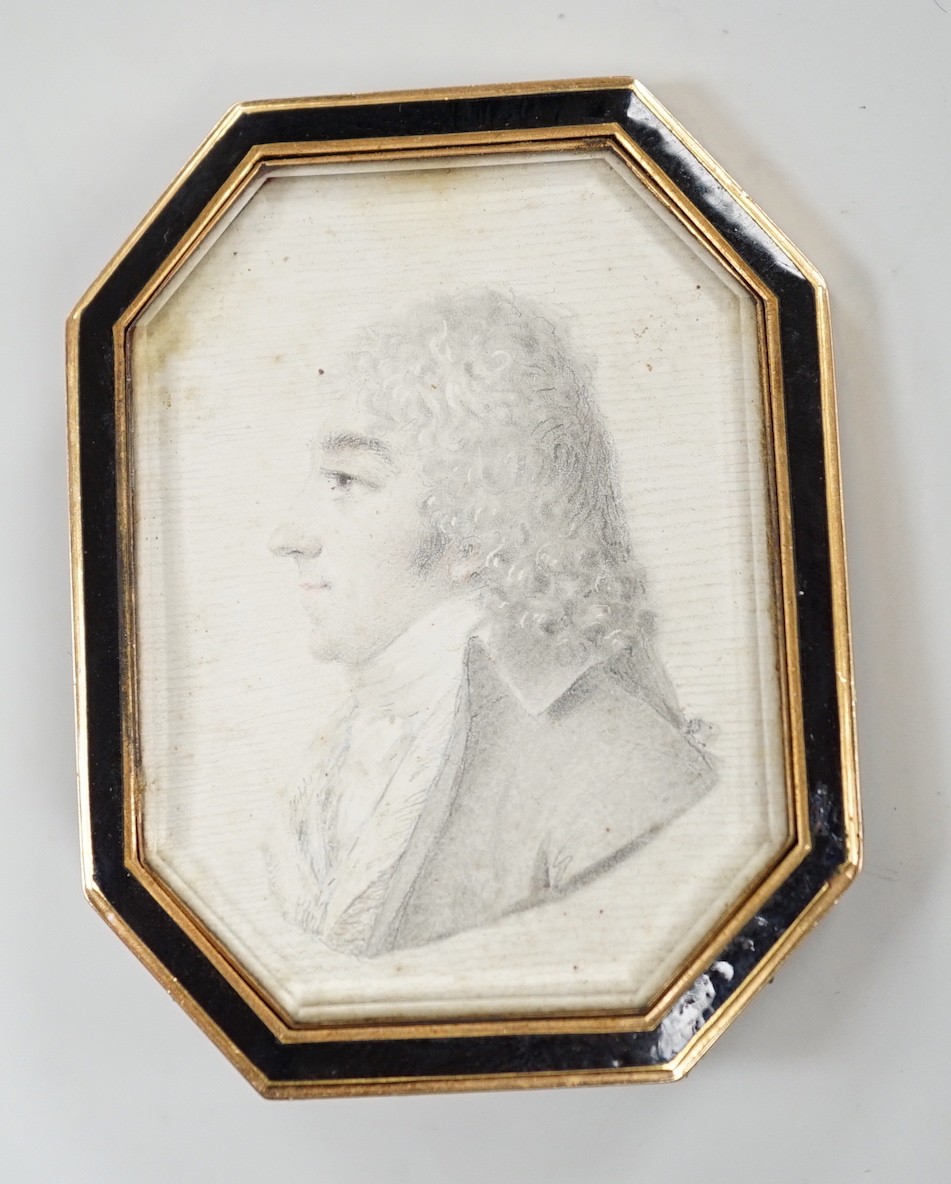 A Regency yellow metal and black enamel framed brooch (pin missing), with inset miniature pencil portrait of a bust of a gentleman to dexter, 51mm.